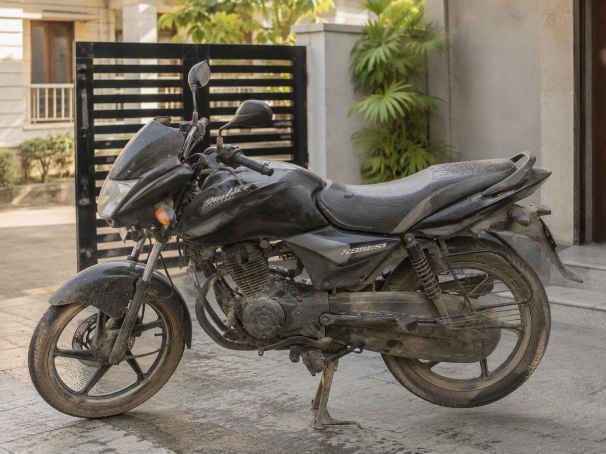 Dusty muddy bike before washing in Tumkur